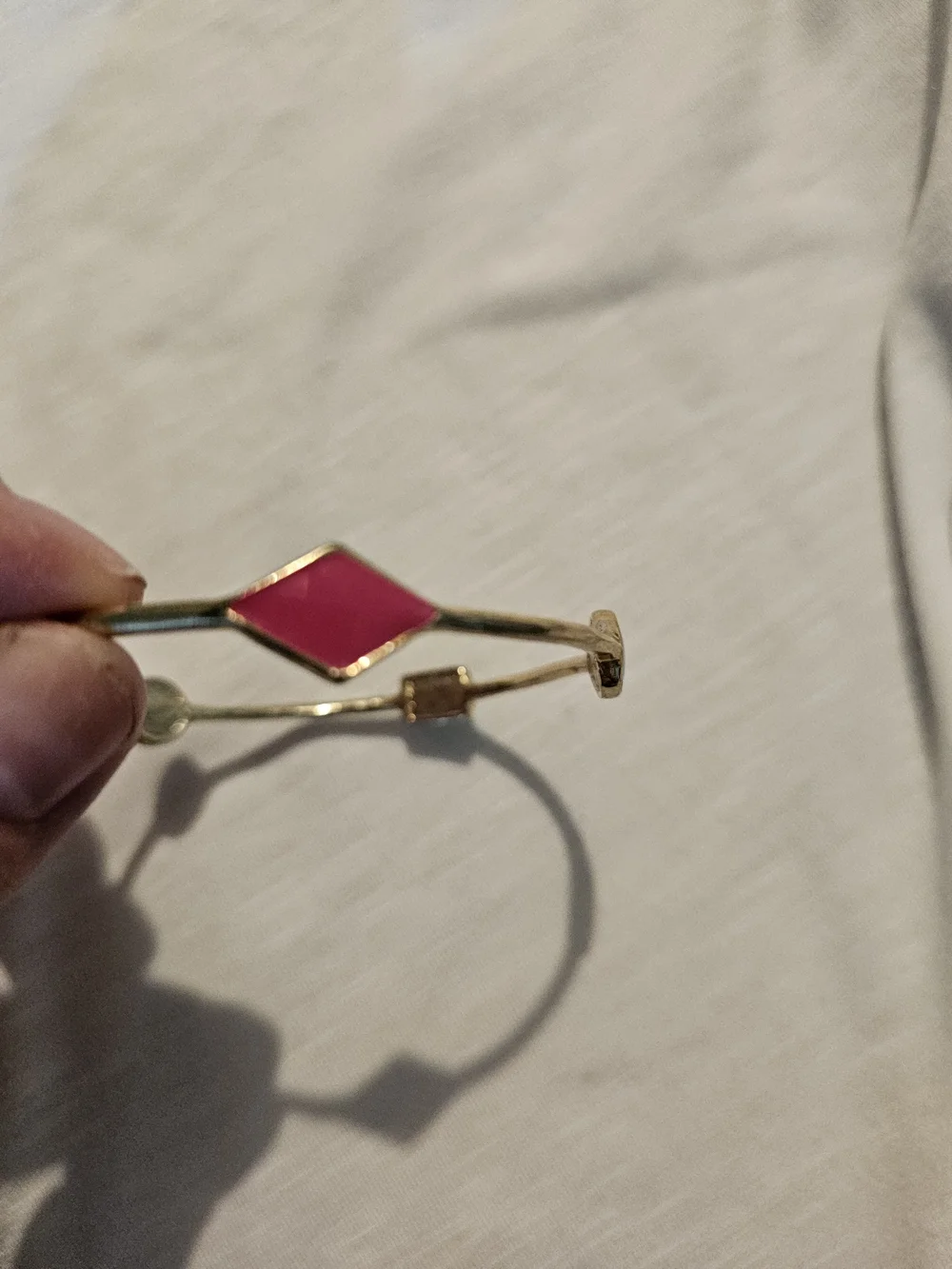 Gold Toned Bangle Bracelet with Multi Color Enamel Accent